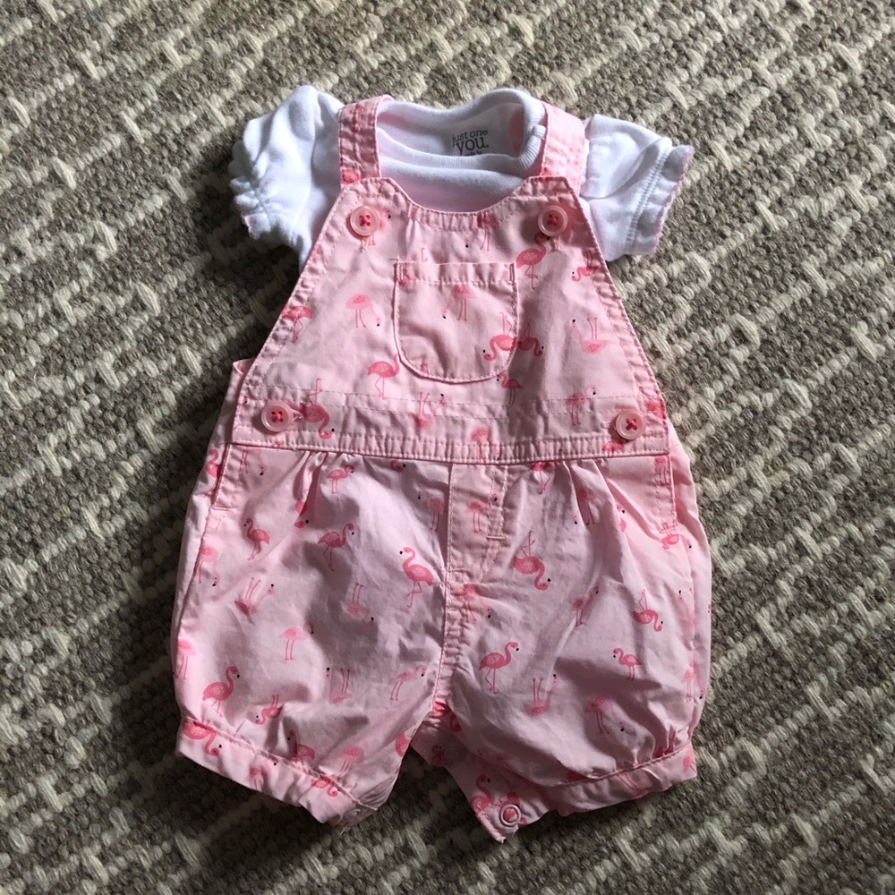 Never worn Carters baby girl overalls